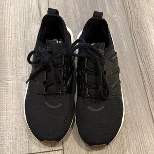 New Balance Women’s Black and White Sneakers